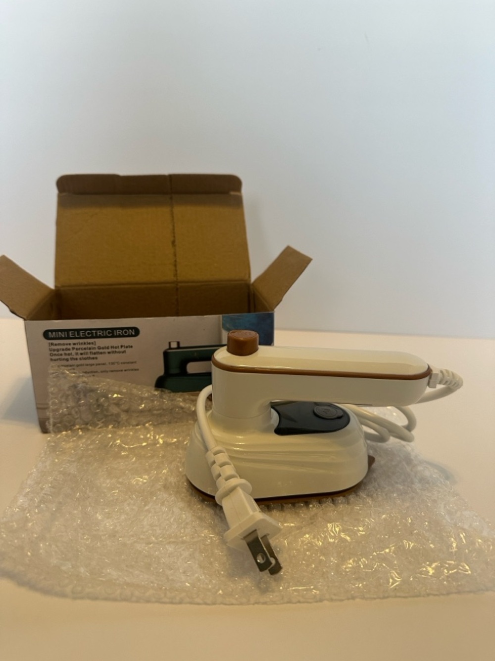 Portable mini electric iron